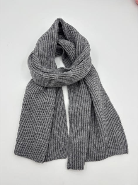 Grey ribbed knit scarf loosely knotted on white background, showing fine rib texture and soft wool-blend fabric