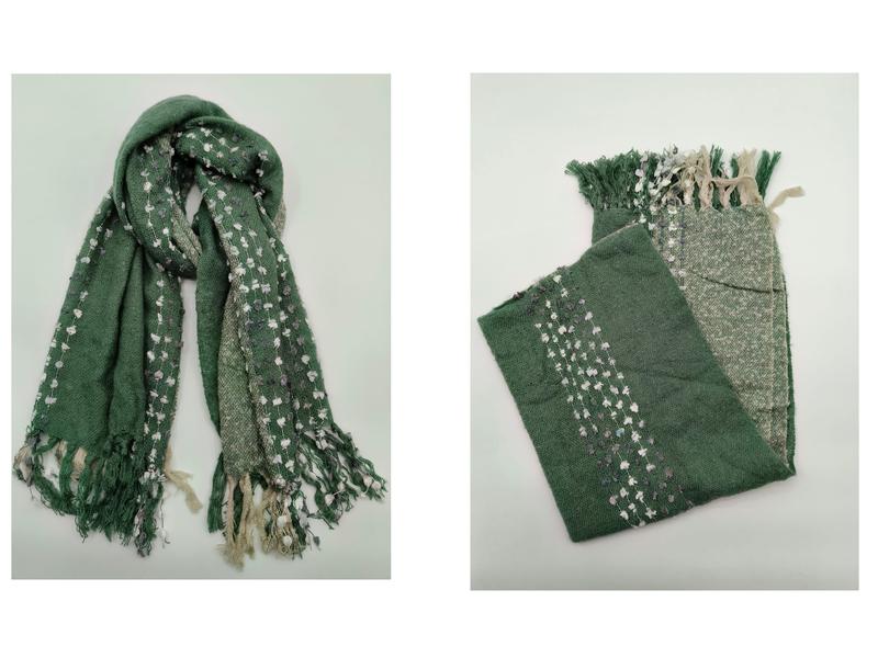Green handwoven scarf with white and lavender floral dot embroidery, fringe ends, shown draped and folded