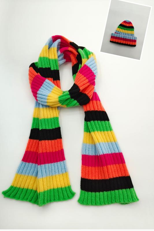 Ribbed knit scarf and beanie hat set with bold multicolor stripes in green, yellow, orange, pink, blue, and black