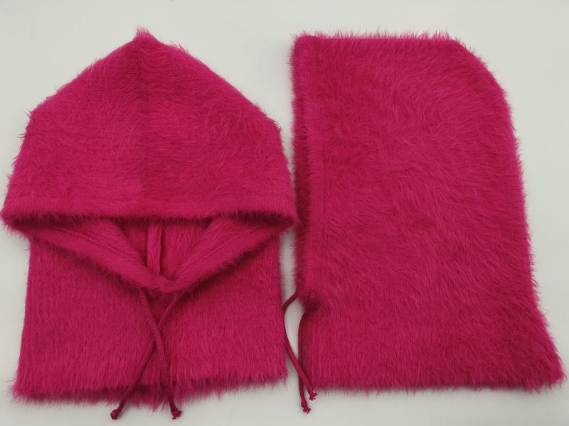 Hot pink fluffy faux fur hooded scarf with drawstring and matching rectangular neck warmer set laid flat