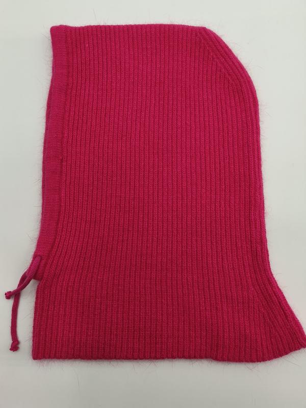 Hot pink ribbed knit balaclava ski hood with drawstring closure, laid flat on white background