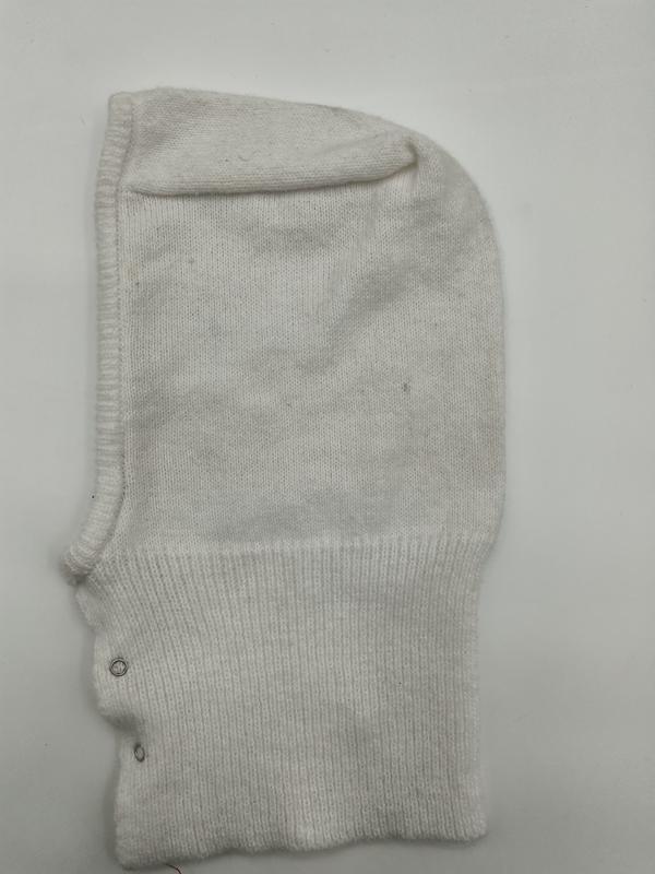 White knitted balaclava ski mask with ribbed trim and metal snap buttons on white background