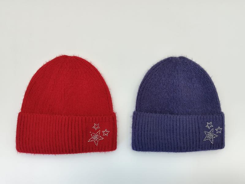 Two fluffy ribbed knit beanies in red and purple, each featuring a silver rhinestone star embellishment on the cuff