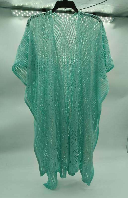 Mint green open-knit lace kimono cardigan with wavy lace pattern, short sleeves, and long length, displayed on hanger