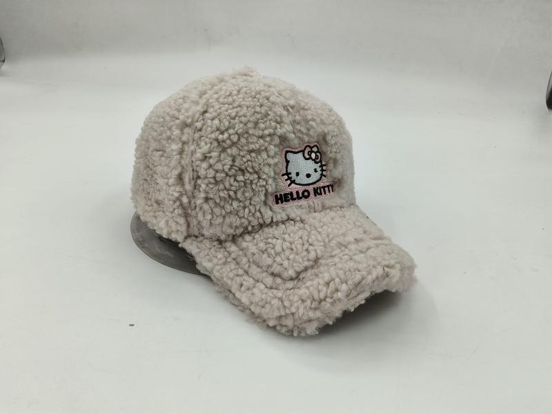 Cream fluffy sherpa teddy fleece baseball cap with embroidered Hello Kitty face patch and pink text on white background
