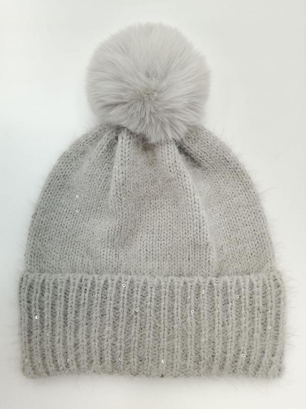 Light grey fuzzy knit winter beanie hat with large faux fur pom pom and scattered silver sequin embellishments
