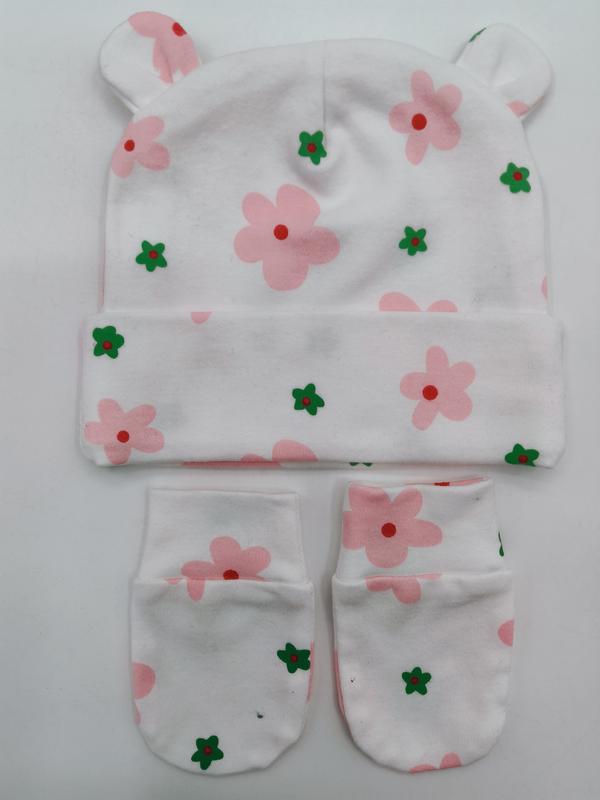 White cotton baby beanie hat with bear ears and matching mittens featuring pink and green floral print pattern
