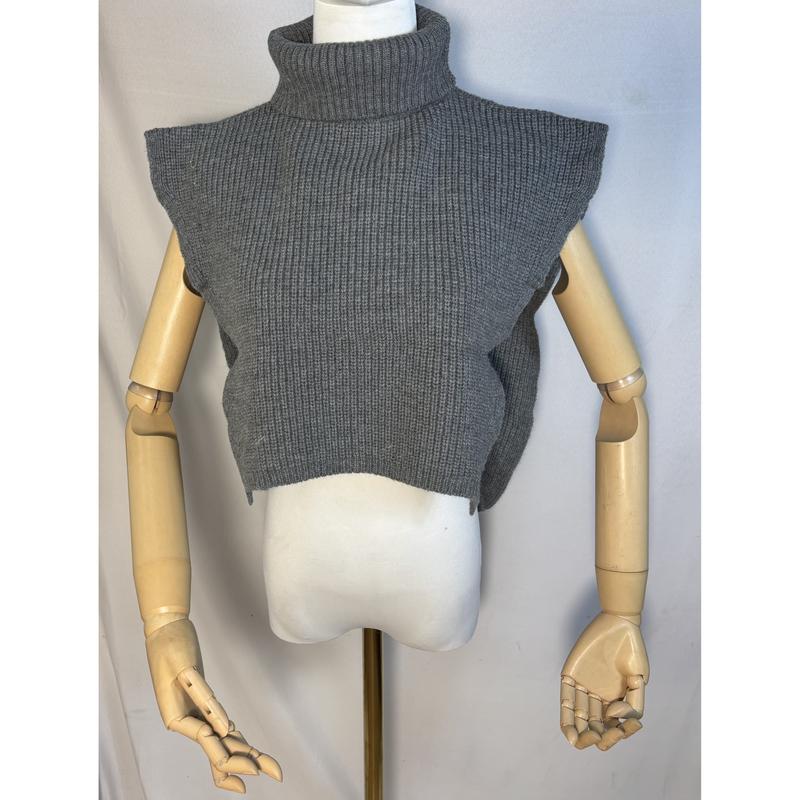 Gray ribbed knit cropped turtleneck sleeveless sweater vest displayed on a mannequin with wooden articulated arms