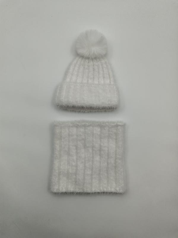 White fluffy ribbed knit winter beanie with faux fur pom-pom and matching neck warmer gaiter set on grey background